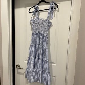 Blue and white striped seersucker maxi dress with tie straps